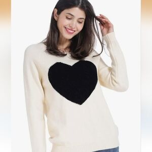 Elegant Cream Sweater with Black Heart